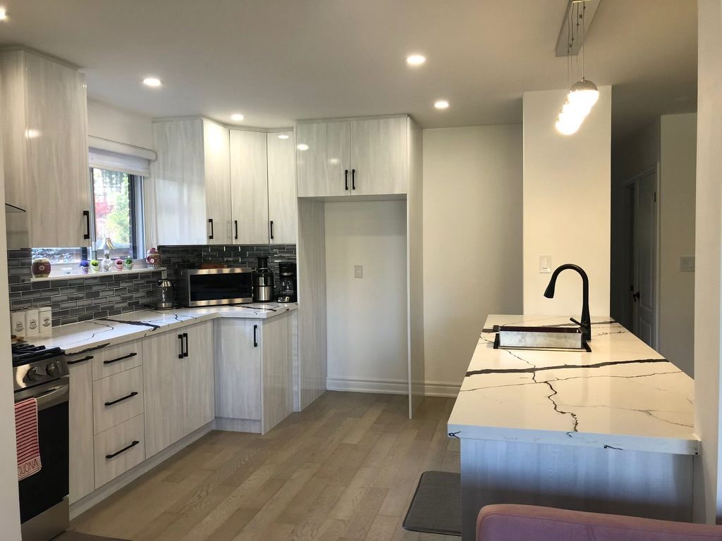 Modern North York kitchen with custom wood-grain cabinets and island