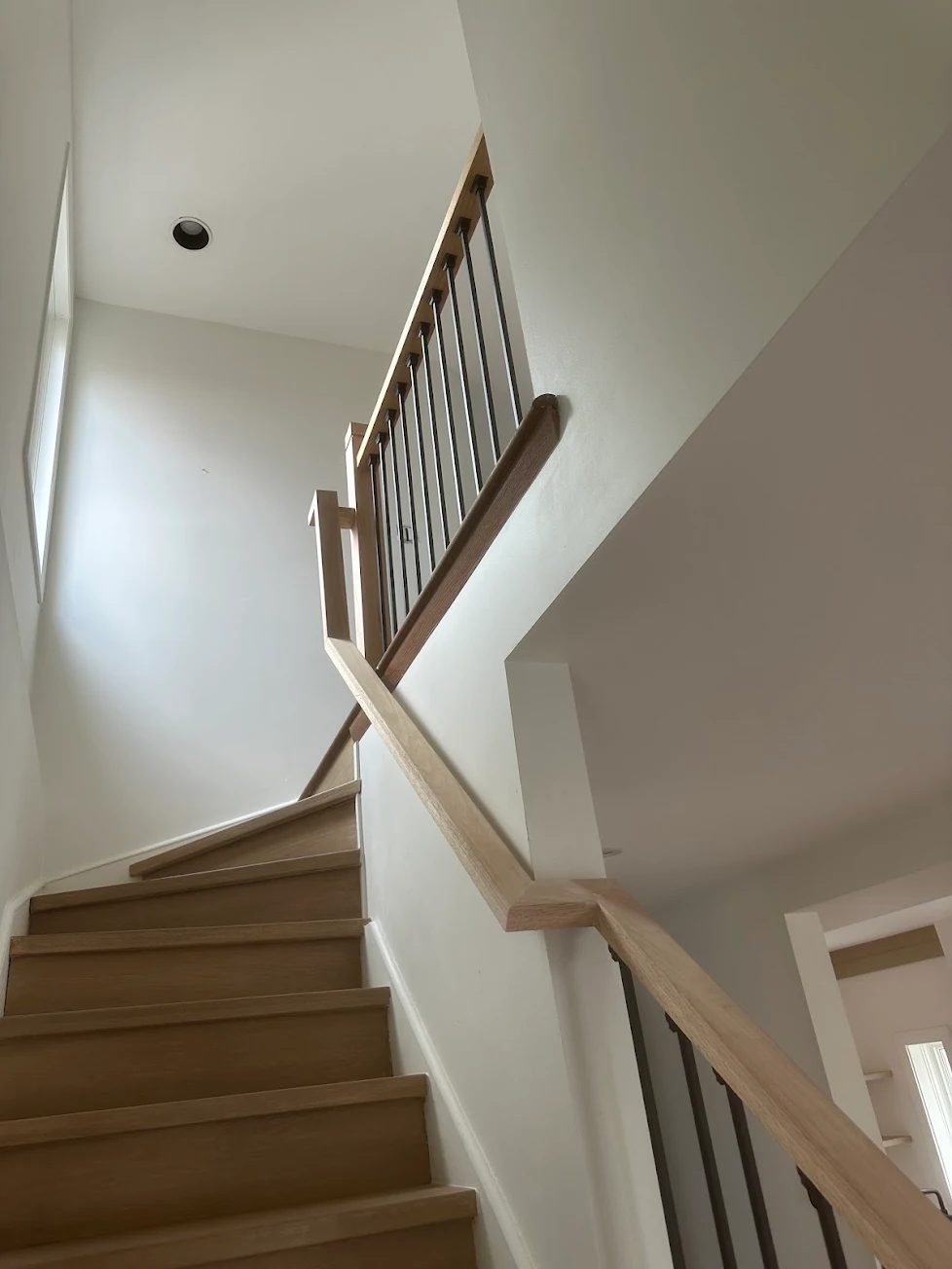 Oak stairs with iron balusters